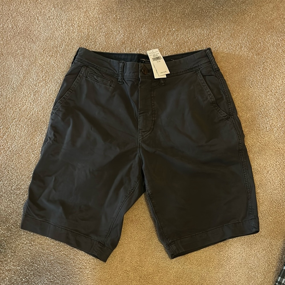 American eagle khakis. Men’s Size 28. Navy blue. Brand new with tags